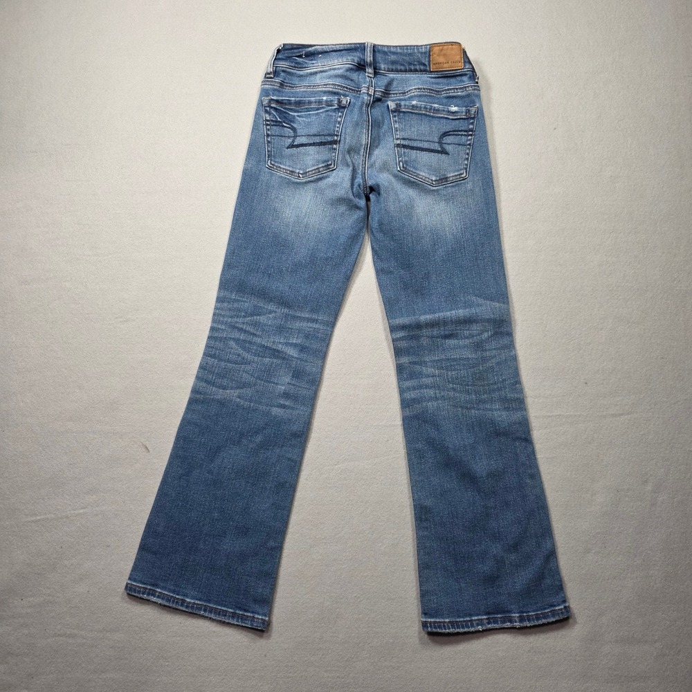 American Eagle Boot Cut Low Rise Super Stretch Medium Wash Jeans - Size 00 - Picture 2 of 6
